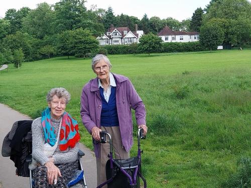 RESIDENTS-IN-PARK-HOME-IN-BACKGROUND